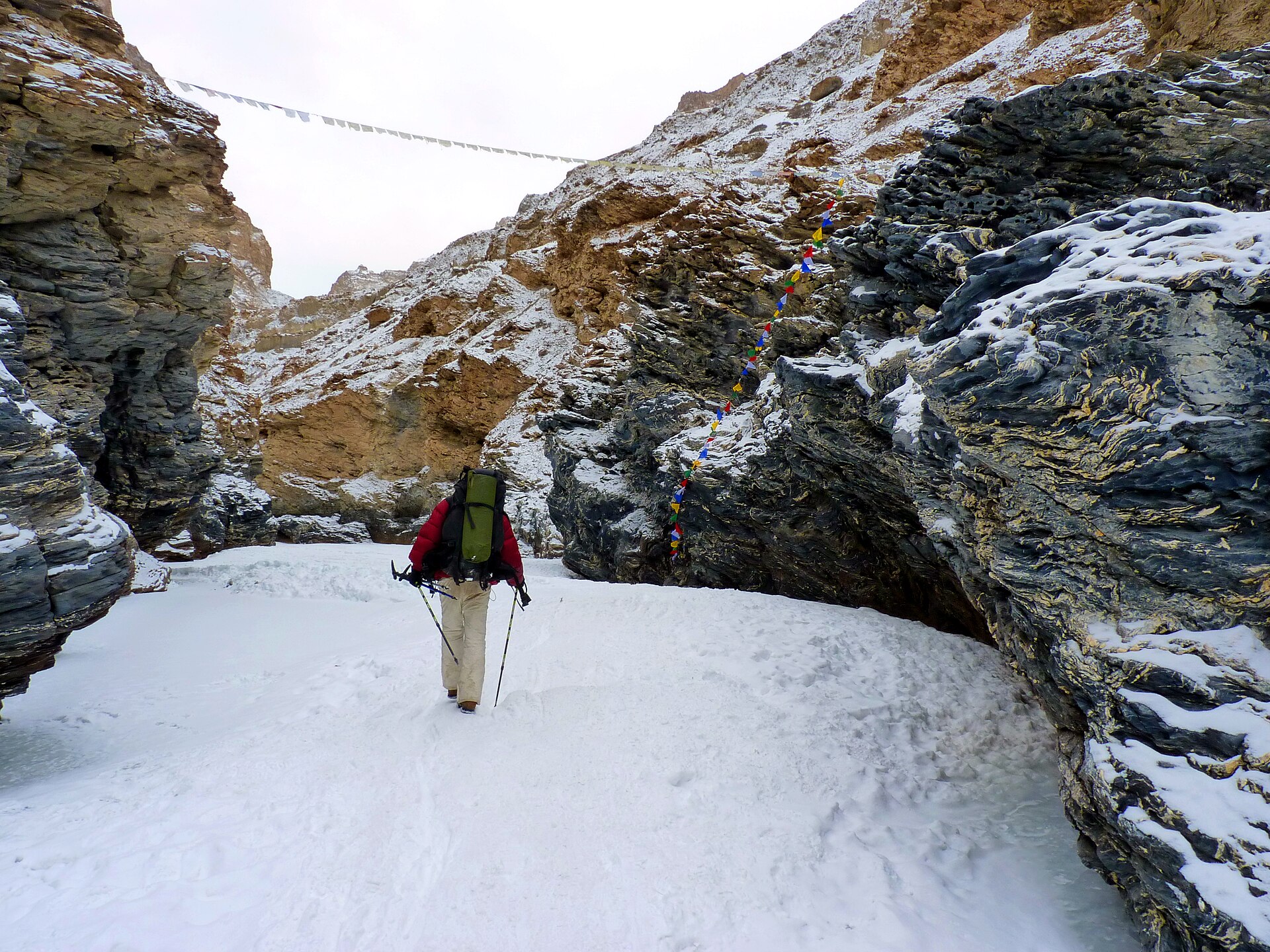 Trekkers crossing the frozen Zanskar river Chadar