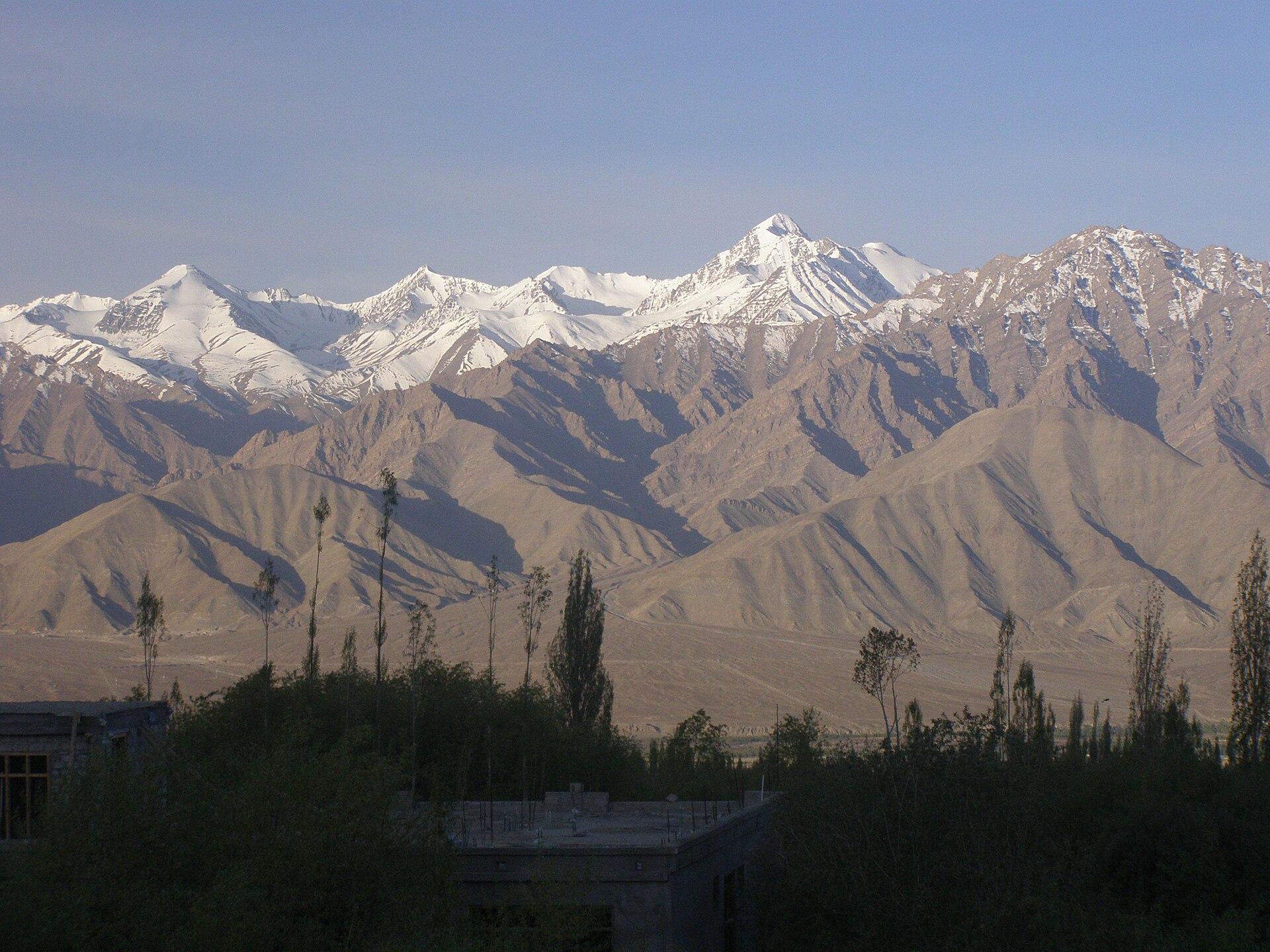 Stok Kangri peak rising above the Stok range